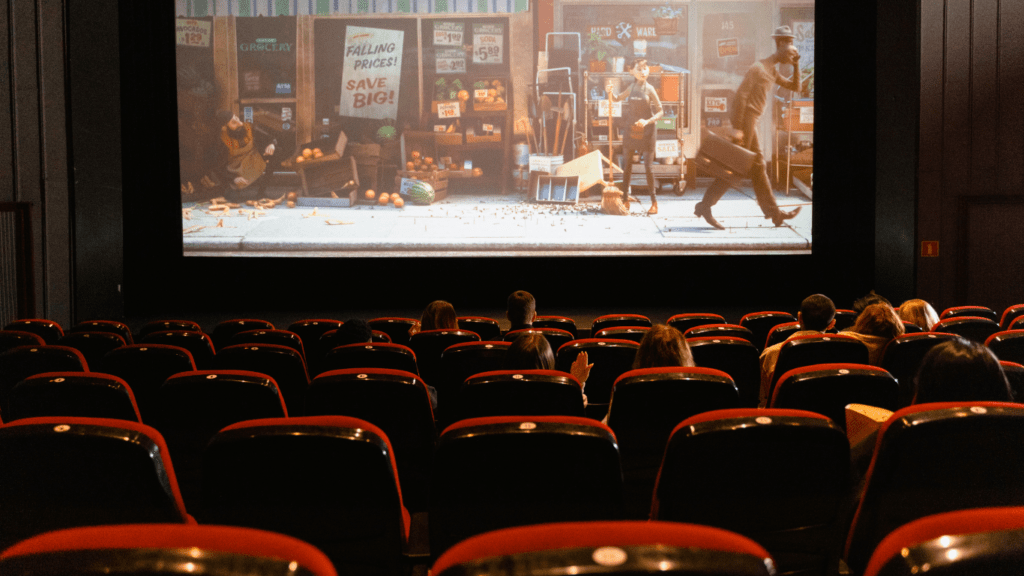 group of people watching in movie theater