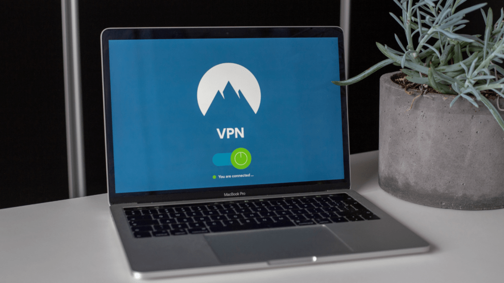 a laptop showing a vpn logo