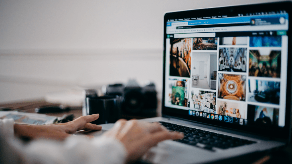 a man using internet in using laptop