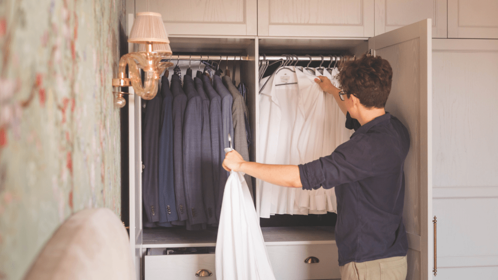 a man organizing his clothes