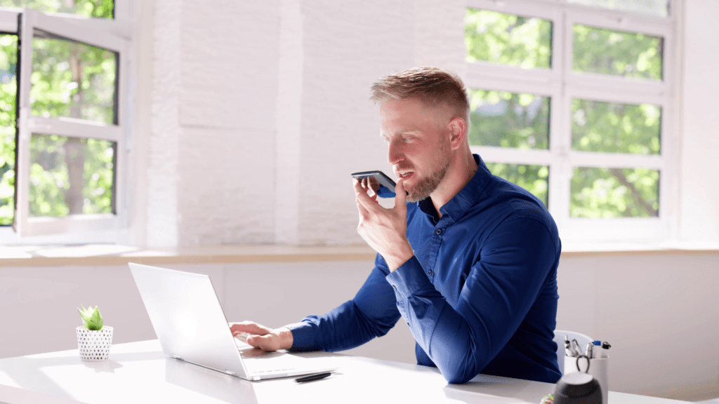 a man recording a voice message