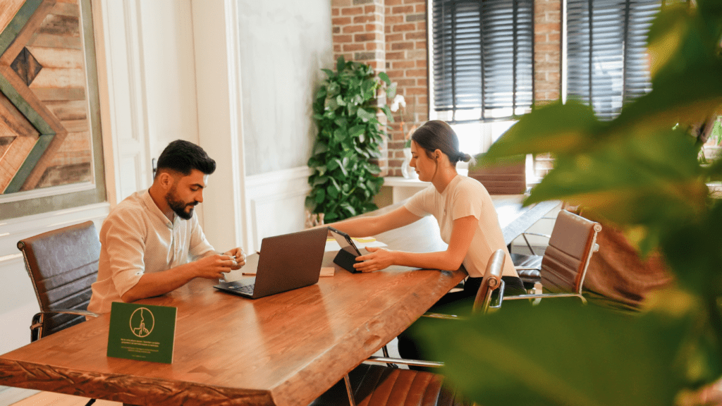 two people working in homey environment 